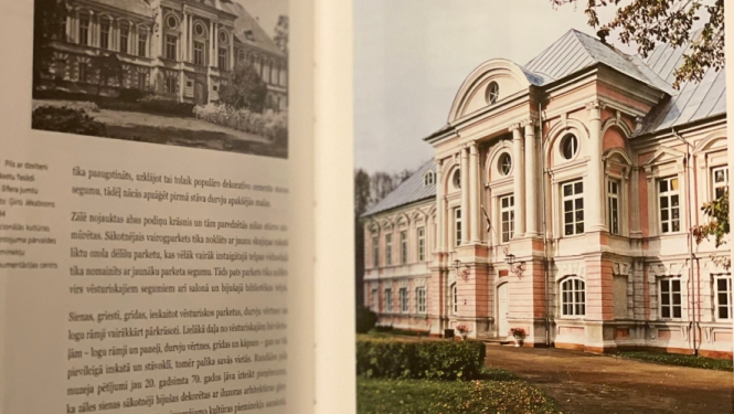 Grāmatas atvērums ar Zaļās muižas attēlu
